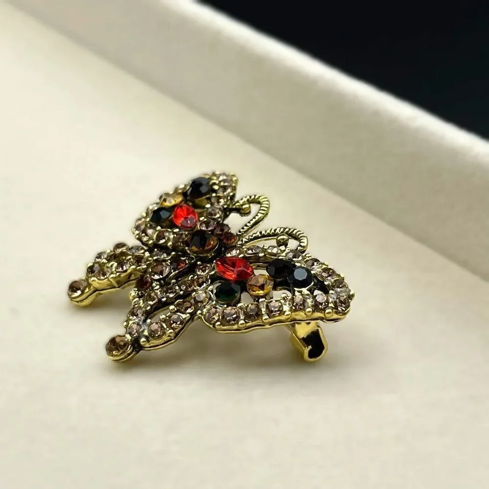 Yellow Gold with Champagne Topaz and Multi Crystal Butterfly Pin Back Brooch